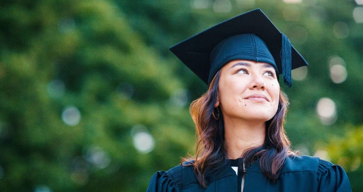 Celebrate success: how to reflect on your online learning achievements this year - image of a woman in graduation robes